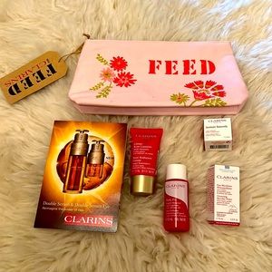 5 Clarins samples and cosmetics bag.